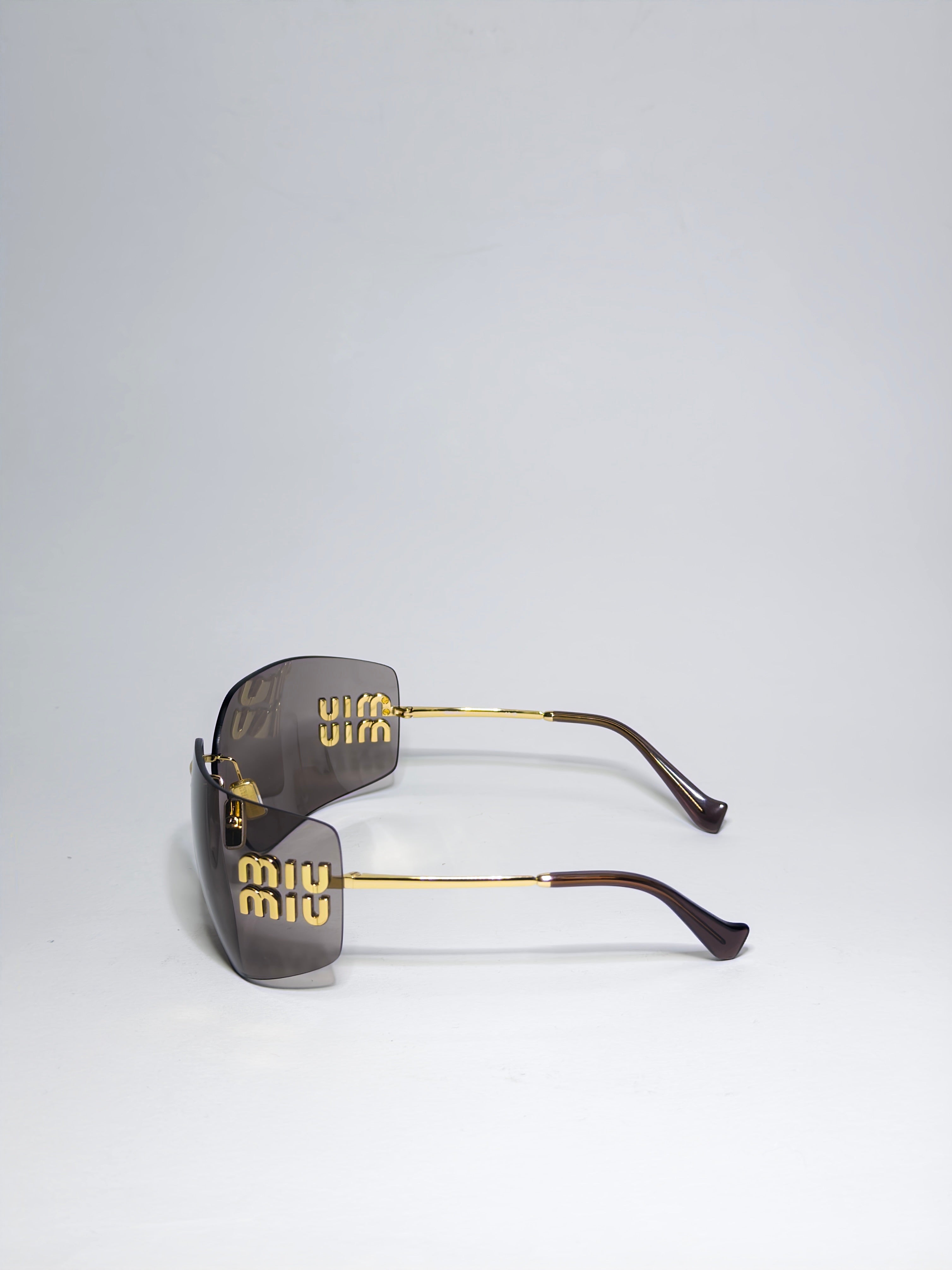 Miu Miu 54YS Runaway Sunglasses