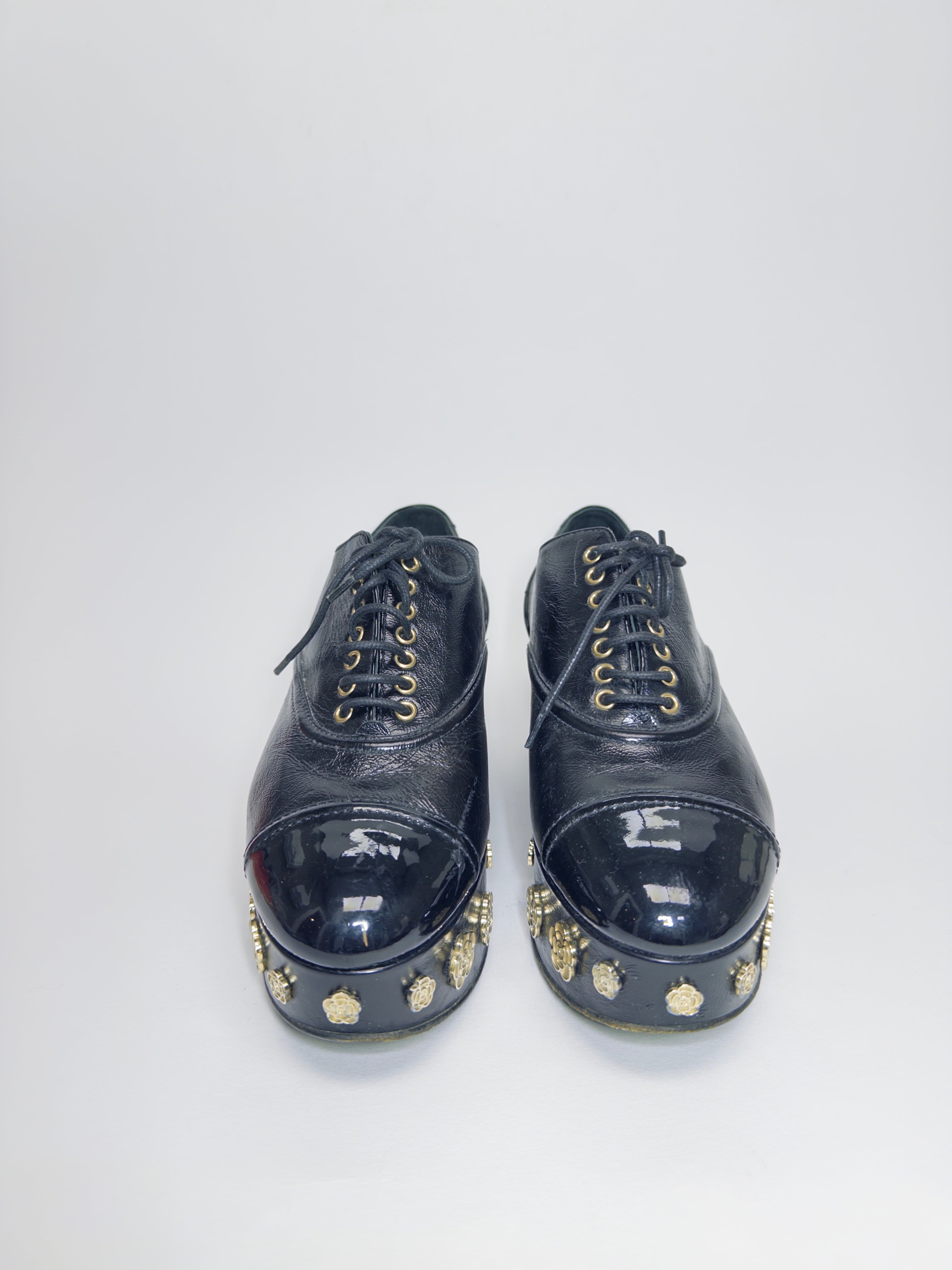 Chanel Black Camellia Platforms
